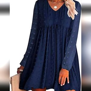 A beautiful blue KIRUNDO babydoll dress for Spring or Summer.